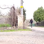 Pic of White girl Victoria Daniels takes a piss next to a pole beside a road
