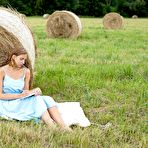 Pic of Young girls Clara Case & Oxana Chic have lesbian sex behind a round bale