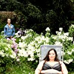 Pic of Super sized BBW Jitka sits on a Peeping Tom's face in the garden