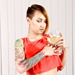 Pic of Babe with tattoos Catherine Sand spreads pussy and pisses right on her belly