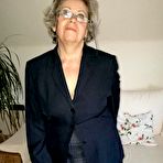 Pic of Old granny dildos her pussy in sheer nylons and garter ensemble