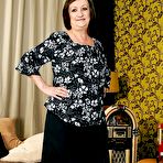 Pic of Fatty granny with big ass Eve Tickler stripping and spreading her legs