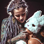 Pic of Tattooed chick suspends her lesbian lover after tying her up with ropes