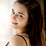 Pic of Sweet brunette teen Purr Simona goes nude in a garter belt and white nylons