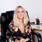 Pic of Over 30 blonde Ally Wild grabs her bare ass after undressing