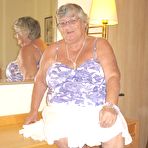 Pic of Fat British nan Grandma Libby completely disrobes while in a hotel room