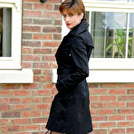 Pic of Sexy mature babe in lingerie and stockings exposing her trimmed pussy