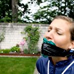 Pic of White girl is left tied up in rainwear with her panties stuffed in her mouth